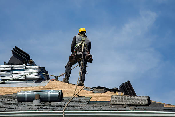 Professional Gutter Installation technician working in Fort Laramie, WY